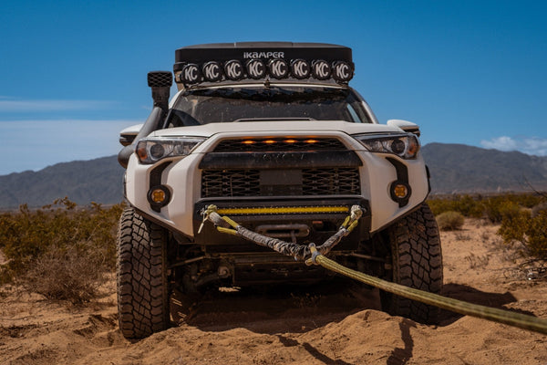 Toyota 4Runner set up for a recovery pull using a kinetic rope during the Weekend Offroad Driving Workshop in a desert environment.
