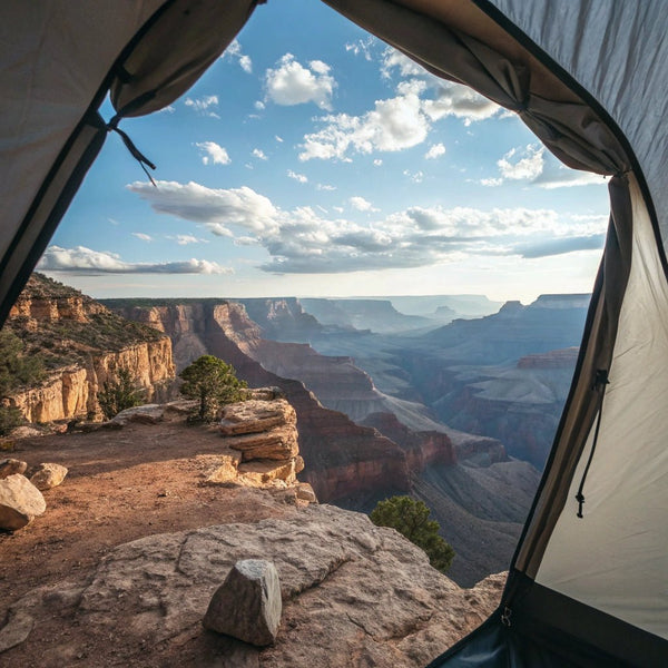 View from inside a tent looking out over canyon cliffs during the Lake and Canyon Relaxation 2026 trip.