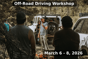 Instructor teaching winching techniques and off-road safety to participants during the Weekend Offroad Driving Workshop held March 6-8, 2026, with a white 4x4 recovery vehicle in the background.