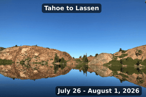 Tahoe to Lassen 2026 event banner showing a calm mountain lake with a perfect reflection of rocky hills and pine trees.