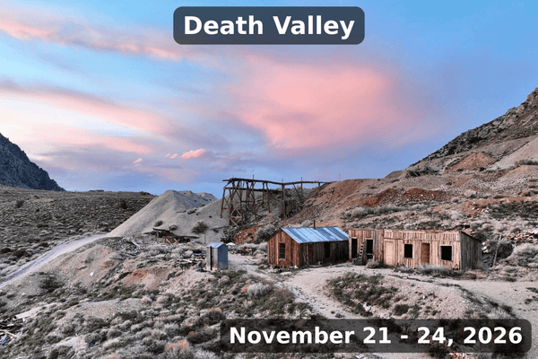 Death Valley event banner showing an abandoned mining site with wooden buildings and desert hills at sunset, labeled “Death Valley” and dated November 21–24, 2026.